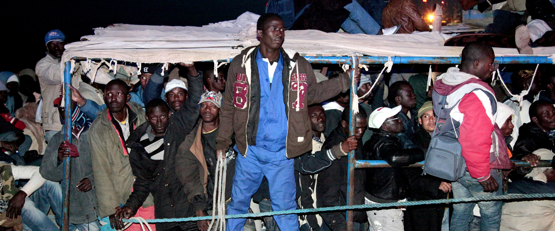 Italiaanse kustwacht redt migranten en vluchtelingen op weg naar Italië. | Foto: Francesco Malavolta | IOM, 2014