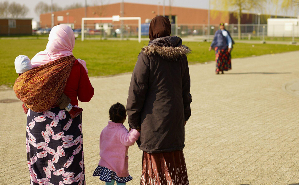 Asielzoekers in een asielzoekerscentrum in Nederland. | Foto: IND