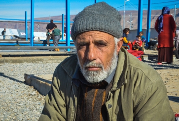 Een Syrische man komt aan in een vluchtelingenkamp in Irak. | Foto: IOM 2014