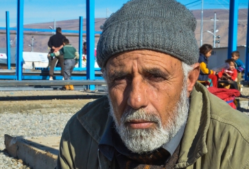 Een Syrische man komt aan in een vluchtelingenkamp in Irak. | Foto: IOM 2014