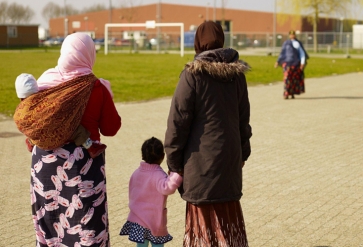 Asielzoekers in een asielzoekerscentrum in Nederland. | Foto: IND